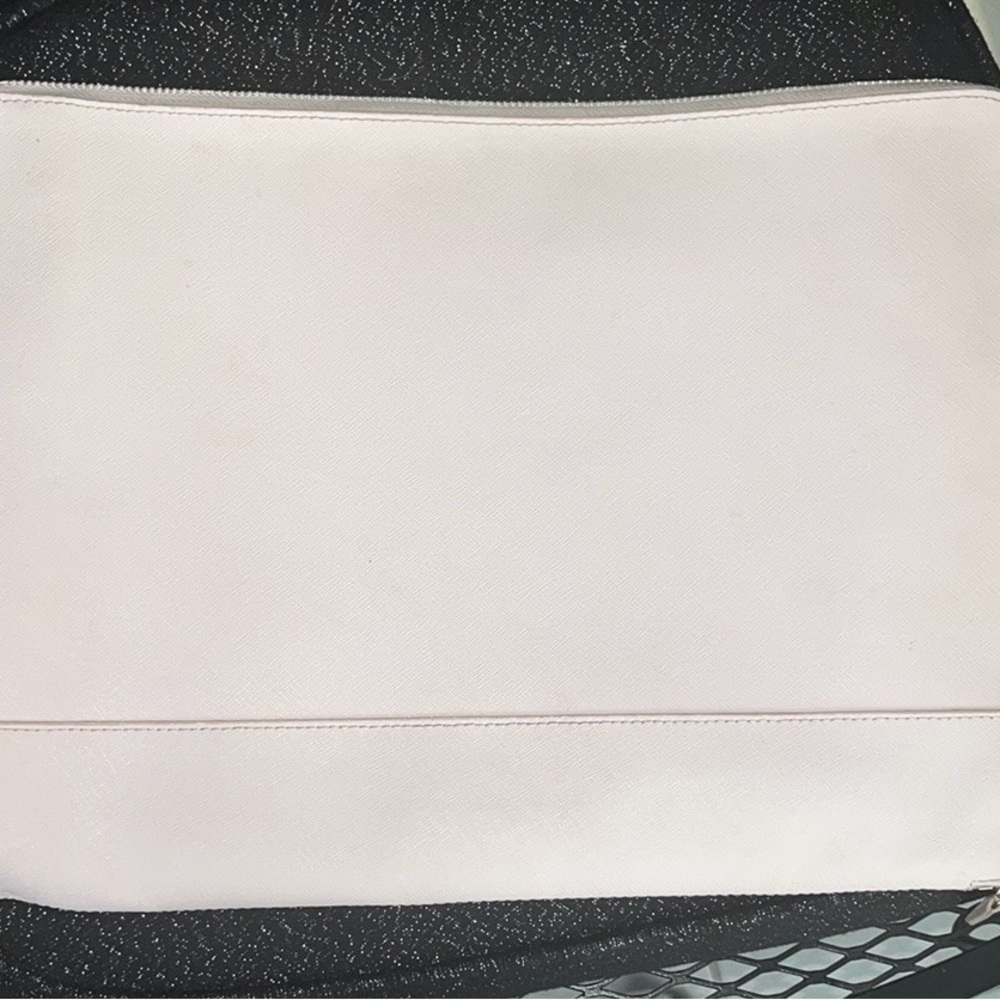 Pink leather laptop case with inside pockets for pens abs misc items